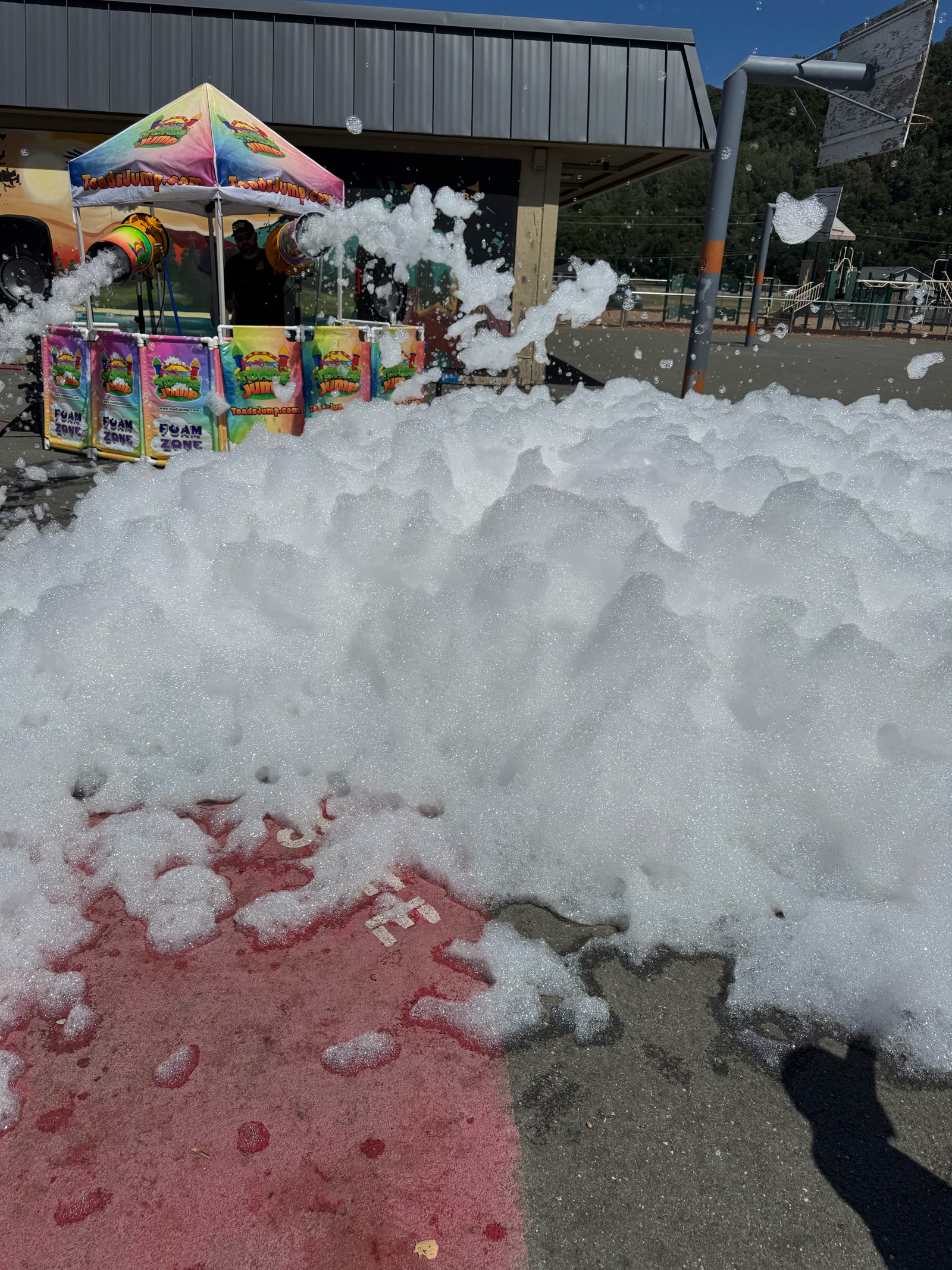 Toads Jump foam party on the grass with a speaker and cannon