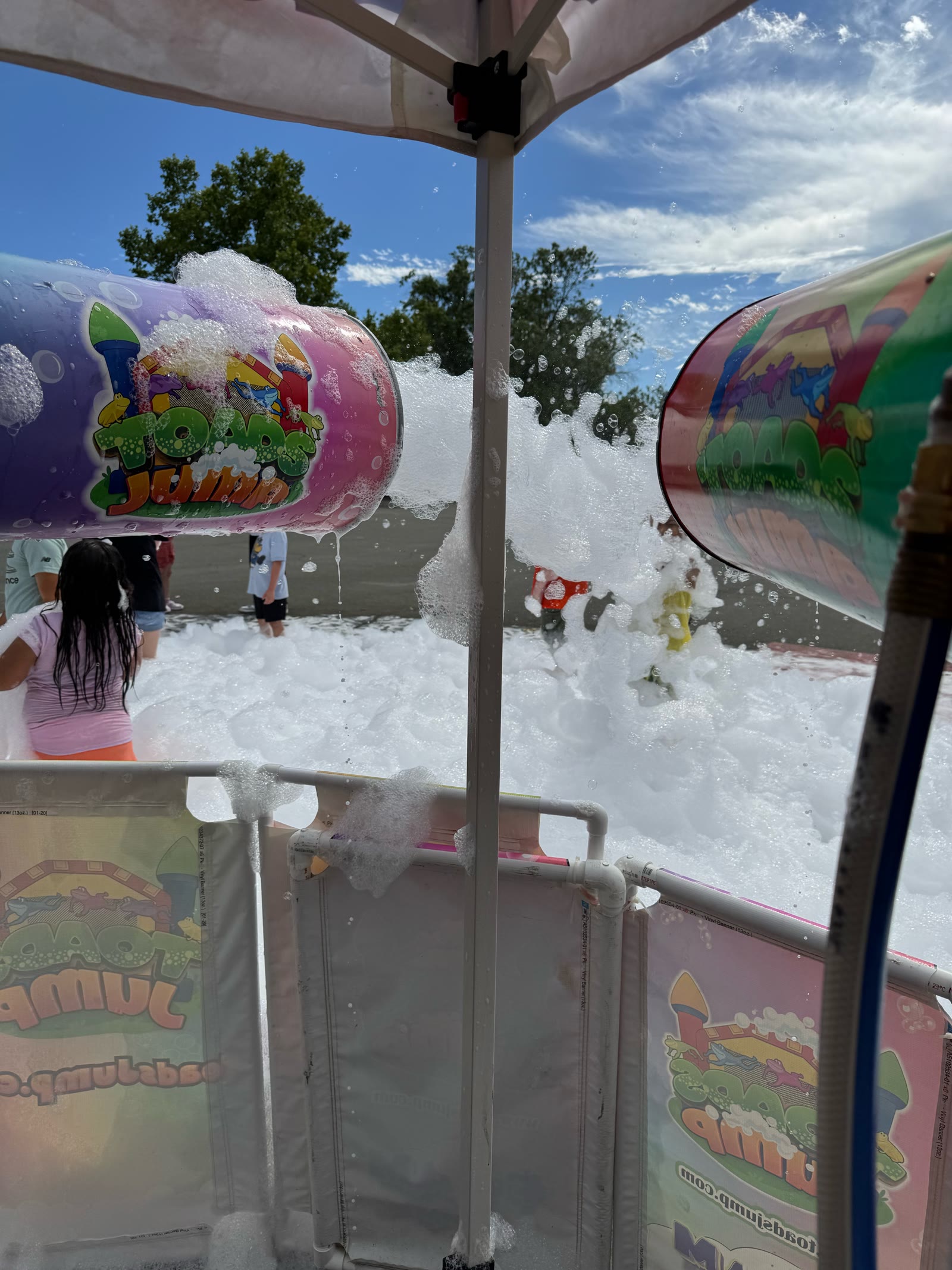 Kids in the foam between two Toads Jump cannons